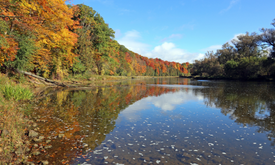 The Grand River with autumn trees lining the water